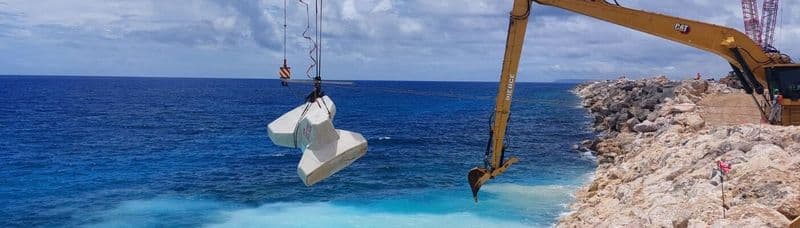 Concrete Layer Innovations: Placing new accropode blocks on Apra Harbor breakwater